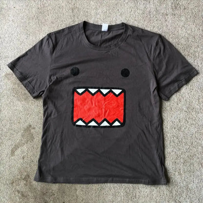 Dark gray y2k anime graphic t-shirt with bold red textured mouth and white teeth in soft cotton material