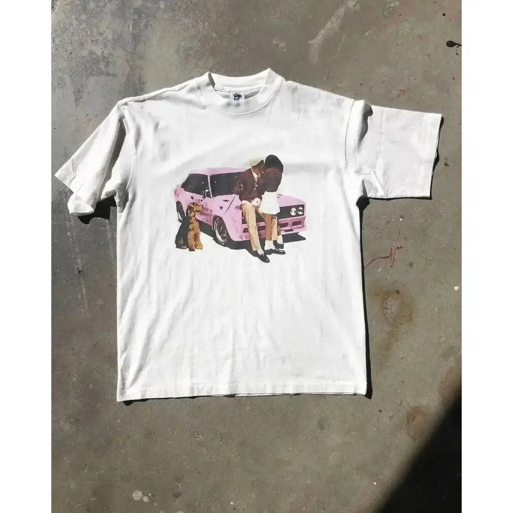White cotton y2k anime graphic t-shirt with a printed design of two people and a dog beside a pink vintage car