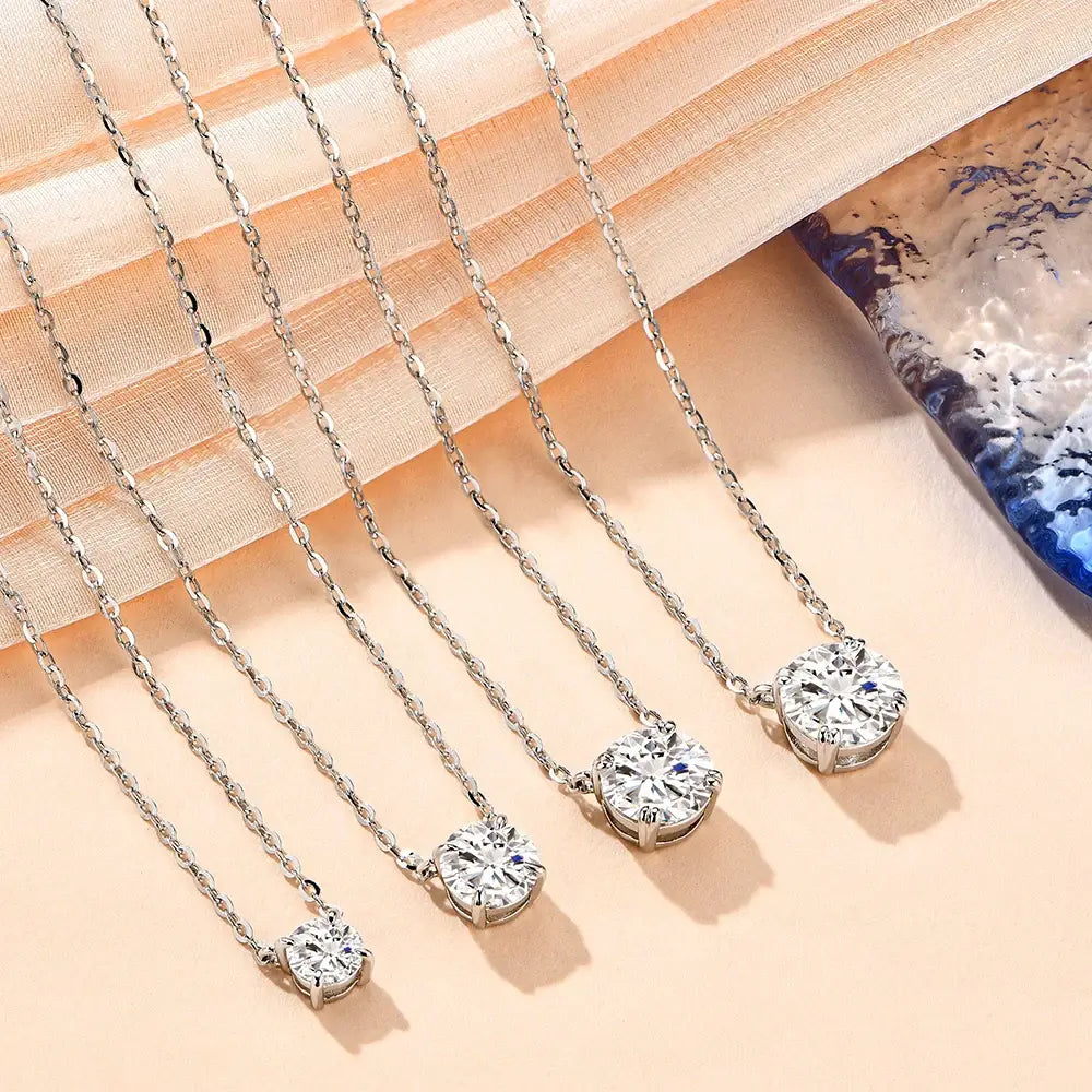 Silver chain necklaces with round d-color moissanite stones in prong settings on 925 sterling silver anime-inspired necklaces