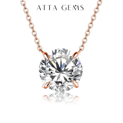 Anime-inspired sterling silver necklace with a d-color moissanite pendant held by four prongs on a rose gold chain