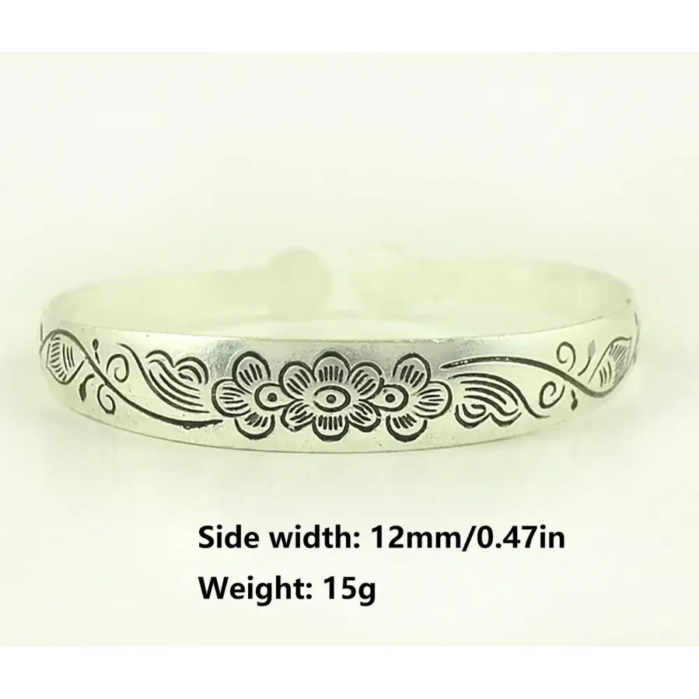 Silver-toned tibetan silver retro cuff bracelet with engraved floral and vine pattern anime-inspired design