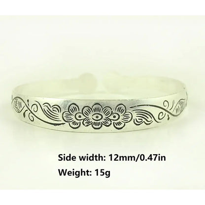 Silver-toned tibetan silver retro cuff bracelet with engraved floral and vine pattern anime-inspired design