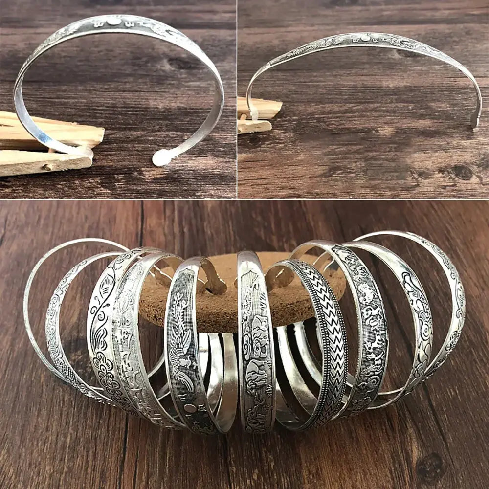 Anime-inspired retro cuff bracelet made of tibetan silver with intricate floral and animal engraved designs