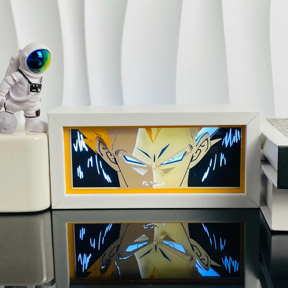 White-framed anime led shadow lamp with illuminated golden character and blue eyes in paper cut wood shadow light box