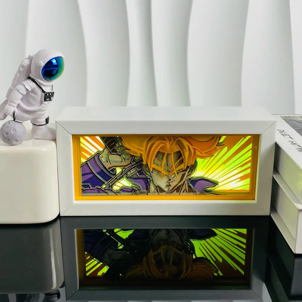 White-framed anime led shadow light box with orange-haired figure in purple armor and vibrant yellow green background