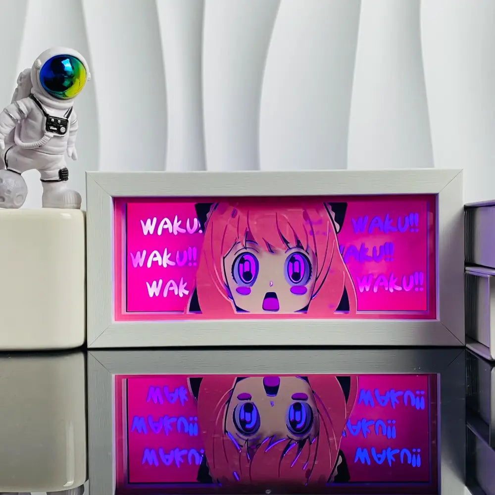 Pink anime led shadow light box with paper cut wood frame featuring a cartoon girl and glowing waku text