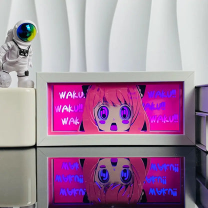 Pink anime led shadow light box with paper cut wood frame featuring a cartoon girl and glowing waku text