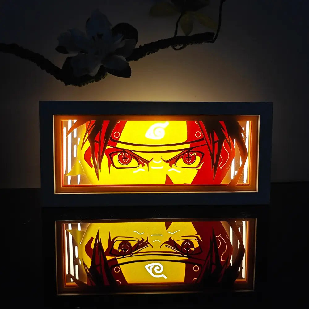 Anime led shadow light box featuring a glowing paper cut wood frame with naruto uzumaki face in red and yellow hues
