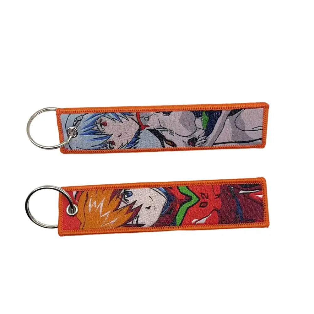 Orange embroidered anime lock keychain with stitched edges and metal ring jet tag featuring anime characters
