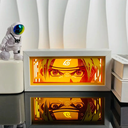 White-framed naruto-themed anime manga 3d led paper carving light box with glowing orange and yellow paper carving light