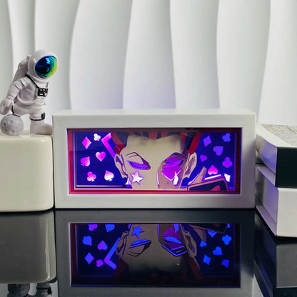 White rectangular led paper carving light box with glowing anime character and purple pink illuminated playing card symbols