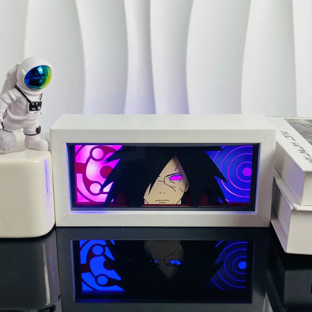 White rectangular led paper carving light box featuring an anime character with purple eyes against pink and blue patterns