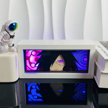 White rectangular led paper carving light box featuring an anime character with purple eyes against pink and blue patterns
