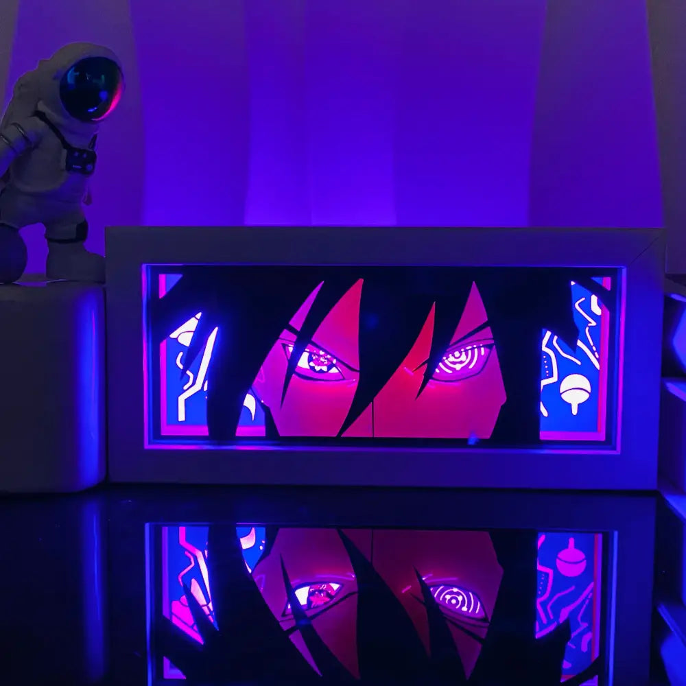 A glowing anime manga 3d led paper carving light box with red eyes and black hair illuminated by purple neon lights