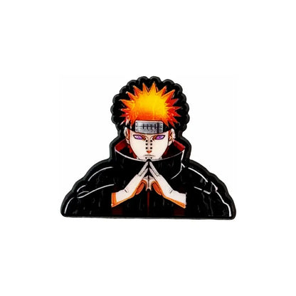 Black enamel pin featuring a stylized anime character with spiky orange hair and purple eyes manga enamel pin