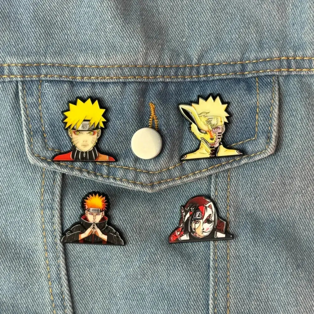 Set of four vibrant naruto manga enamel pins with detailed designs including a white button pin for backpacks