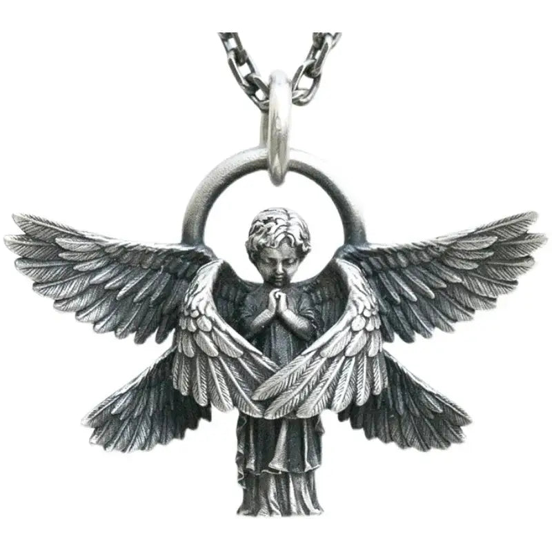 Silver pendant necklace featuring a detailed silver angel with praying figure and wings on a chain pendant necklace