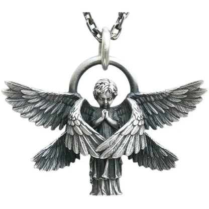 Silver pendant necklace featuring a detailed silver angel with praying figure and wings on a chain pendant necklace