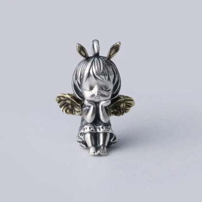 Silver and gold-toned anime mecha girl pendant necklace with delicate wings bunny ears and serene expression