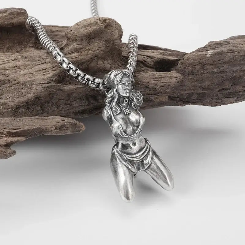 Silver pendant necklace featuring a detailed anime mecha girl figurine kneeling with flowing hair and punk style design