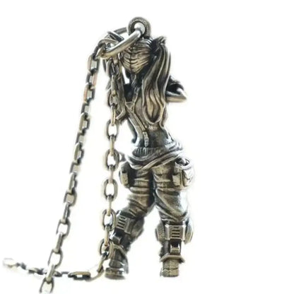 Silver pendant necklace featuring a detailed anime mecha girl figurine in combat gear holding dual chains pendant necklace
