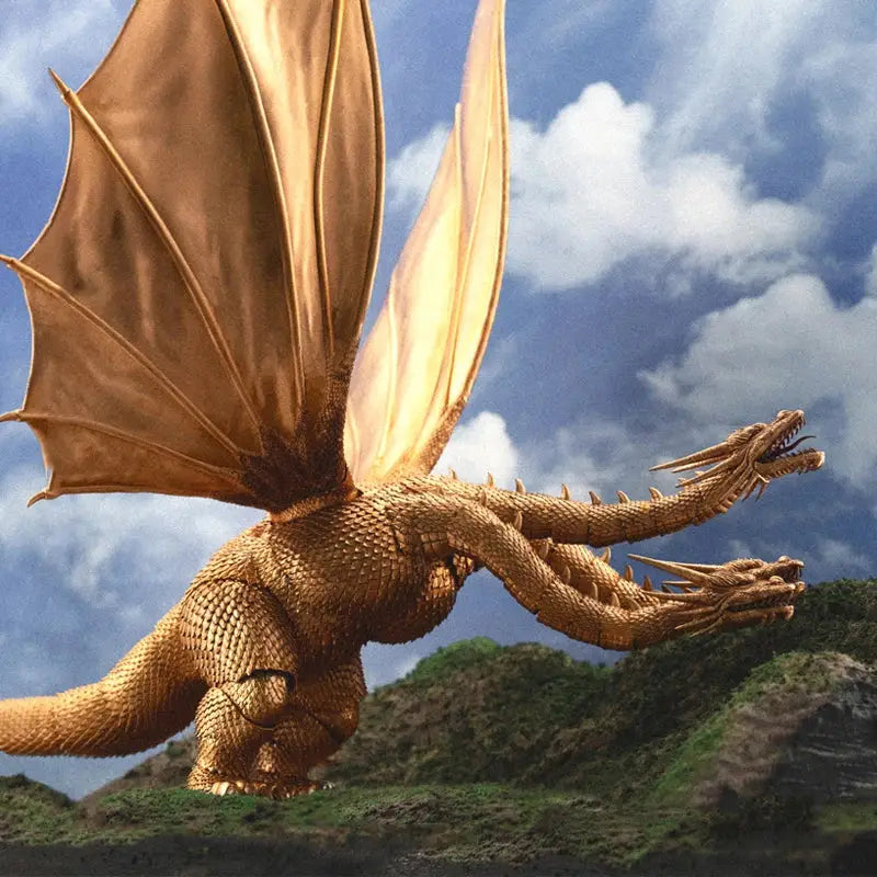Golden metallic three-headed dragon statue with expansive wings featured in anime merchandise sold out notice