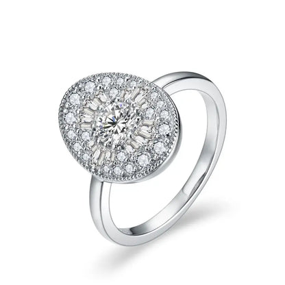 Silver anime moissanite ring with white gold plated band featuring a round brilliant stone and diamond halo setting
