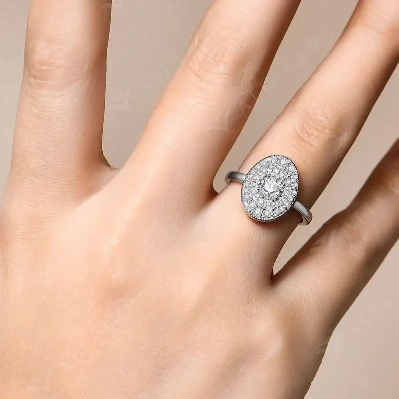 Anime moissanite ring with a sparkling oval diamond halo set in sleek white gold plated s925 silver band