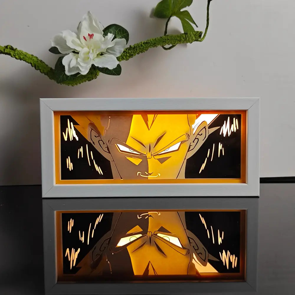 White-framed anime night light box featuring a glowing yellow stylized character face with dynamic motion lines