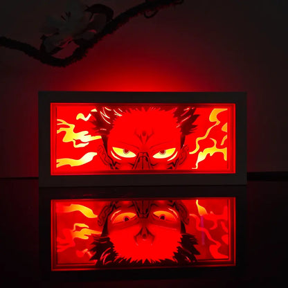 Red and yellow illuminated anime paper-cut led lamp featuring a stylized demonic face with remote control and glowing eyes