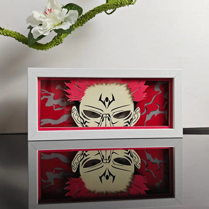 White-framed anime paper-cut led lamp with red spiky hair design and remote control for paper-cut led night use