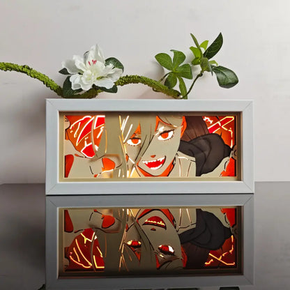 White-framed anime paper-cut led light box with glowing orange and red accents and 7-color remote light