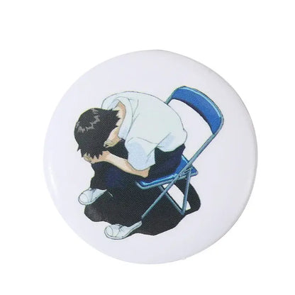 White circular anime pin brooch featuring black-haired character on blue chair with durable tinplate and pin backing