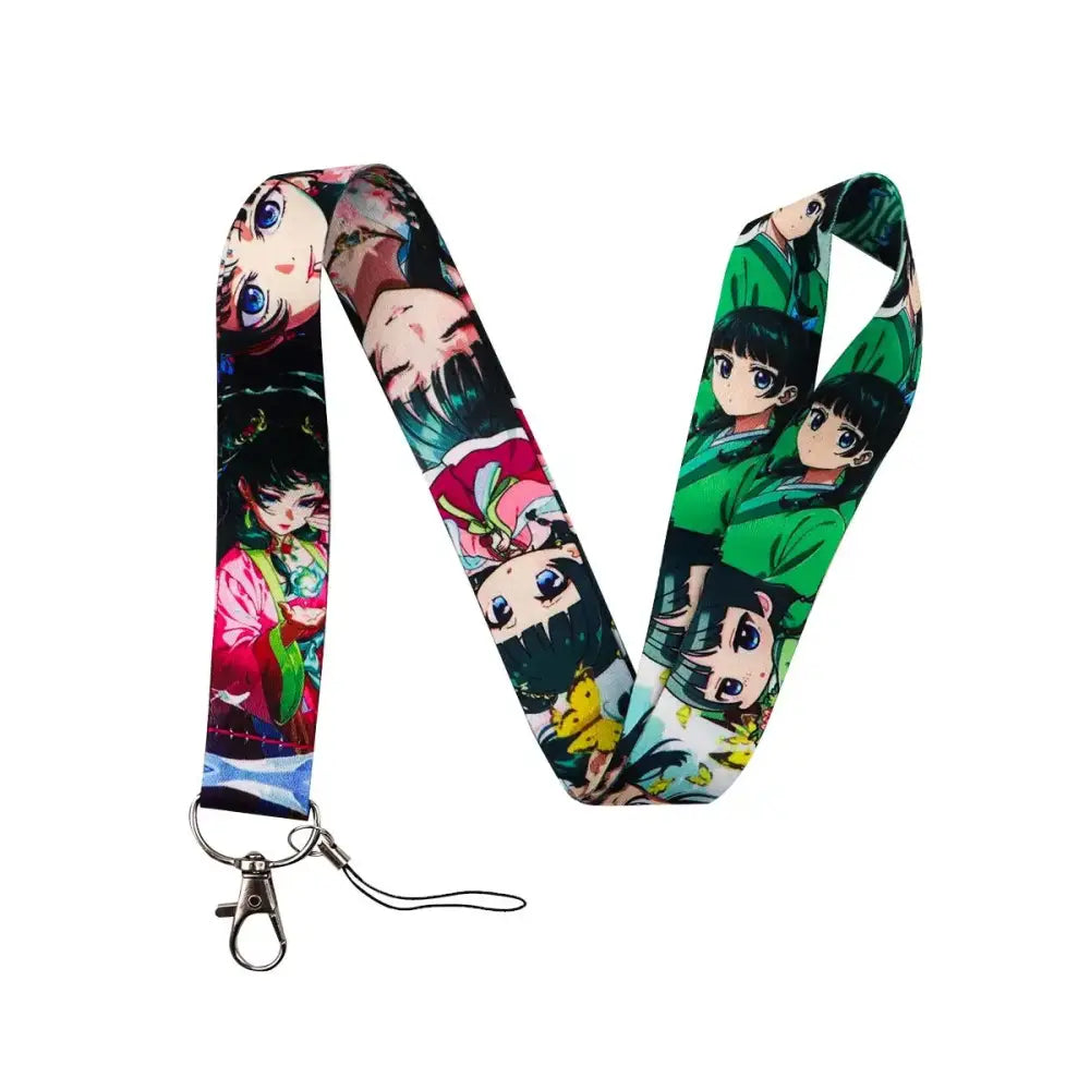 Colorful anime series neck strap lanyard with vibrant green and pink character print and silver metal clasp for id cards