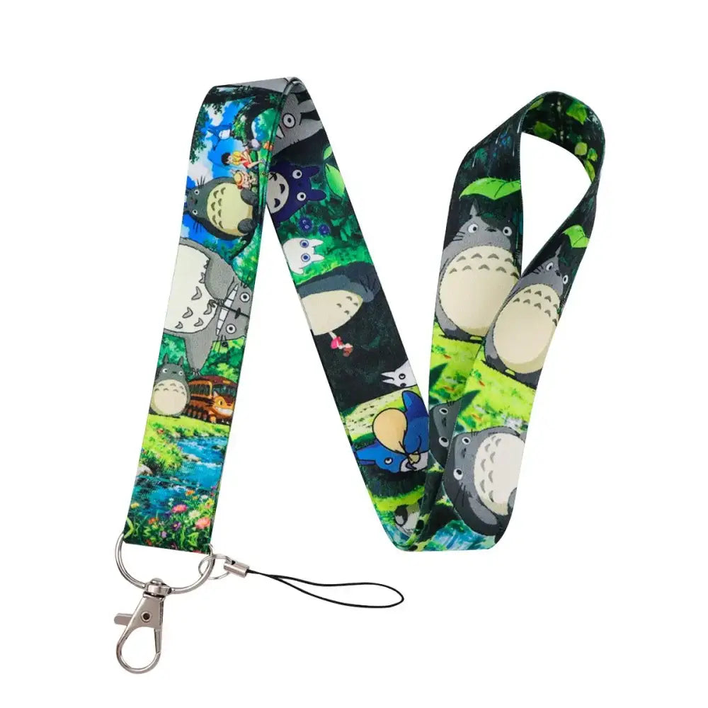Colorful totoro-themed neck strap lanyard with vibrant forest print on fabric and silver metal clasp for id cards