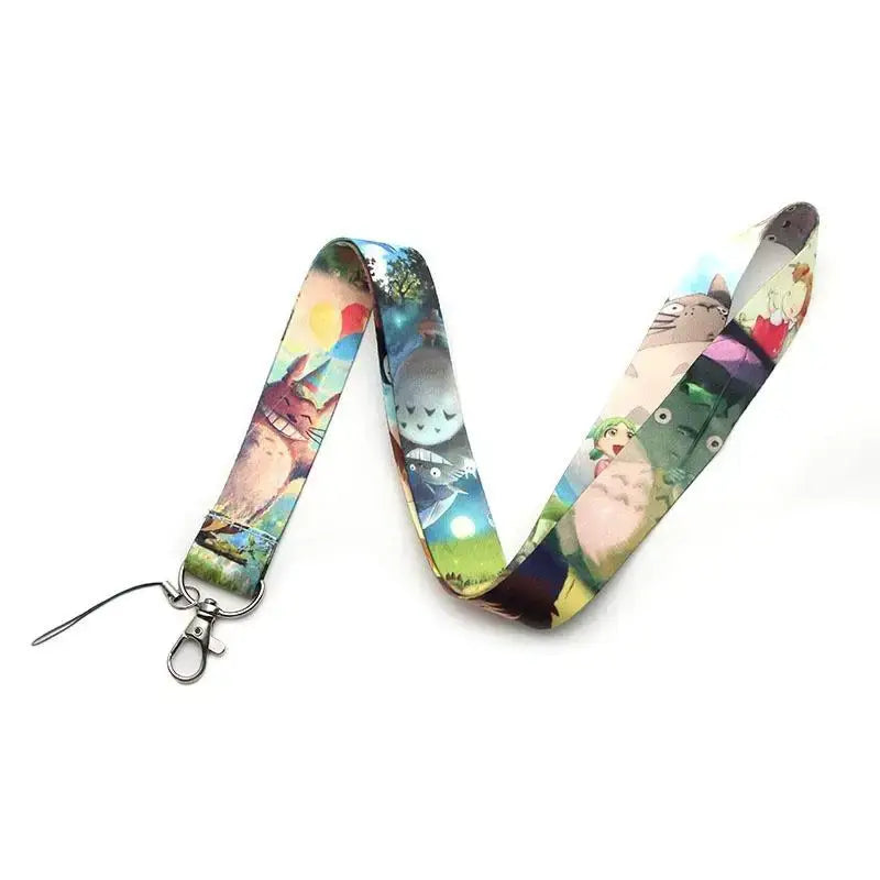 Anime series neck strap lanyard featuring a colorful totoro design with silver metal clasp and thin black cord strap lanyard