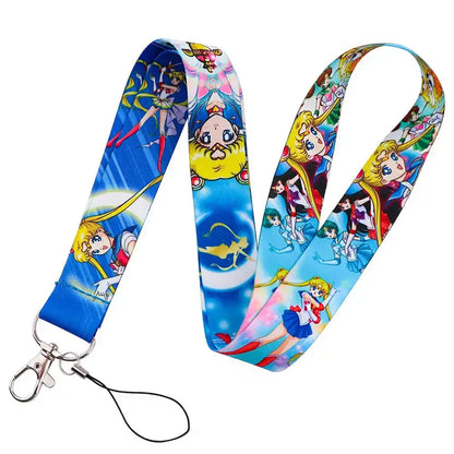 Anime series neck strap lanyard featuring vibrant blue fabric with colorful sailor moon characters and silver metal clasp