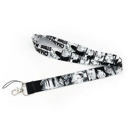 Black and white comic-style anime series neck strap lanyard with chainsaw man design and silver metal clasp for ID card holder