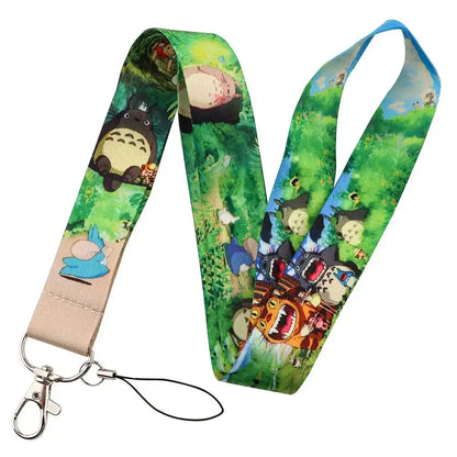 Vibrant fabric neck strap lanyard with colorful totoro print and lush green backgrounds for id card holding