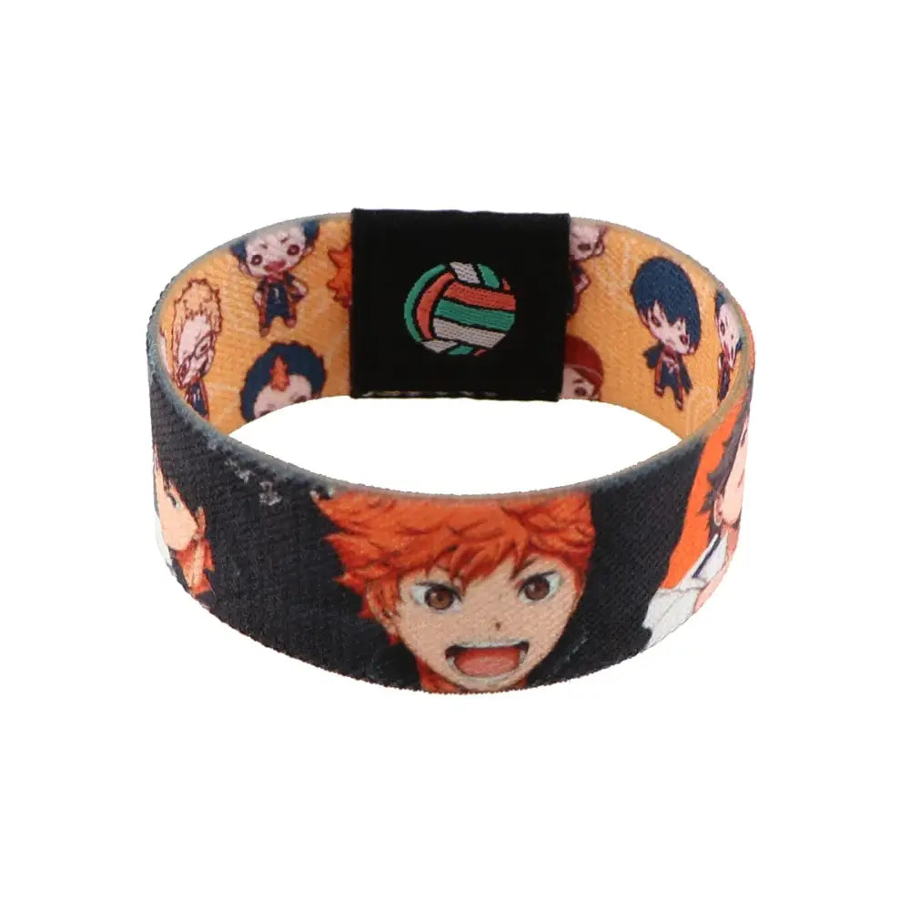 Orange and black wide band armband with haikyuu chibi anime characters and a central volleyball patch for daily wear