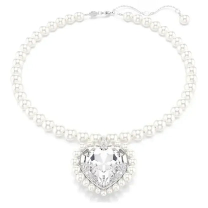 Elegant anime tennis necklace in sterling silver featuring a pearl design with a heart-shaped crystal pendant