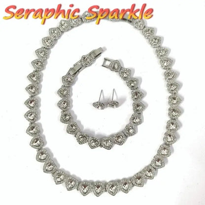 Silver heart-shaped sterling silver tennis necklace set with matching rhinestone bracelet and stud earrings