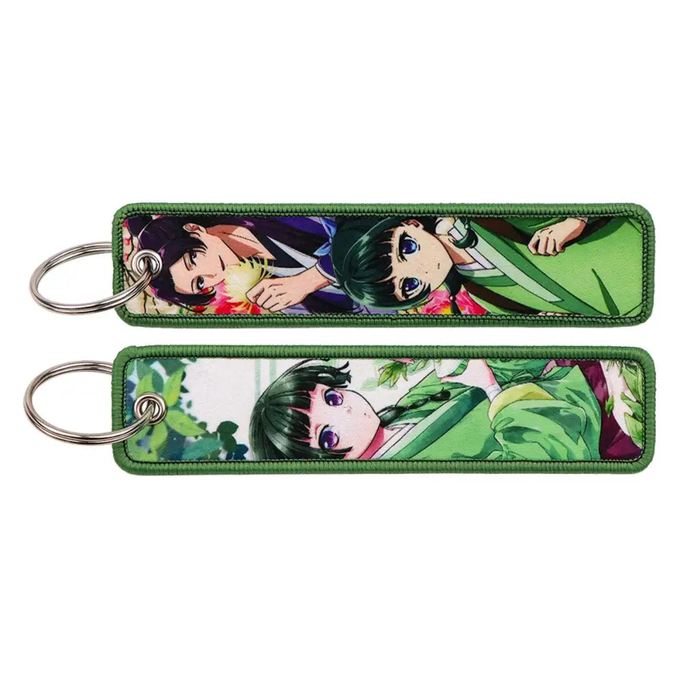 Green embroidered maomao key chain with vibrant anime characters metal key ring apothecary diaries design