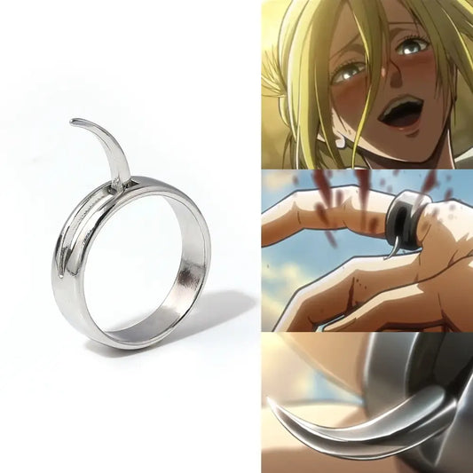 Silver-toned metal annie leonhart ring with curved claw-like protrusion in transformation style design