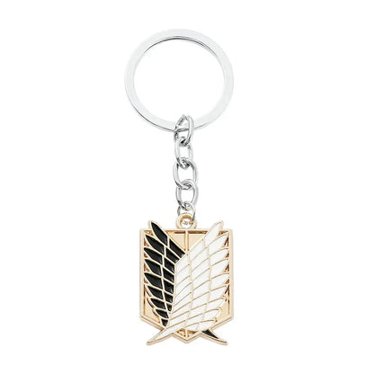 Silver and gold enamel scout regiment pin keychain featuring the iconic attack on titan emblem