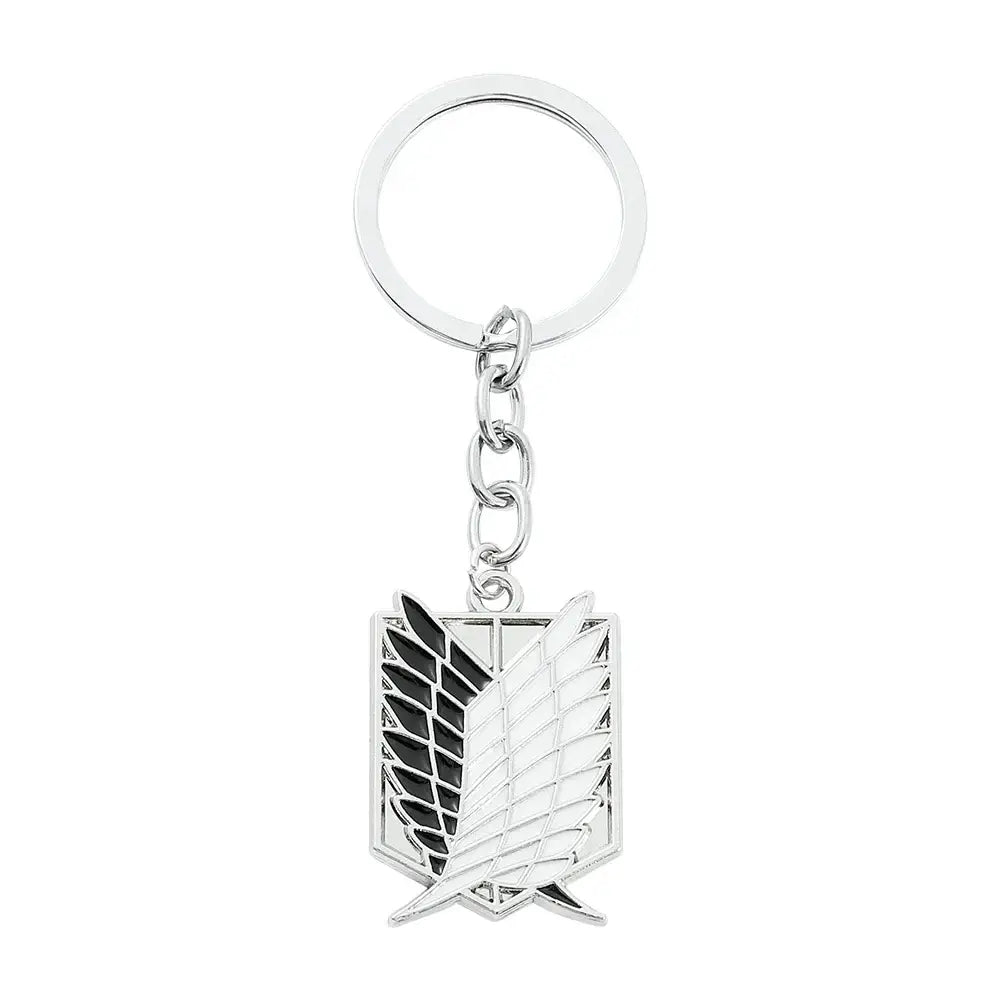 Silver metal scout regiment enamel pin keychain with black and white enamel detailing from attack on titan