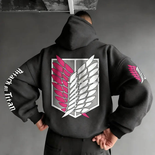 Black attack on titan wings oversized hoodie back side featuring pink and white winged emblem with sleeve graphics