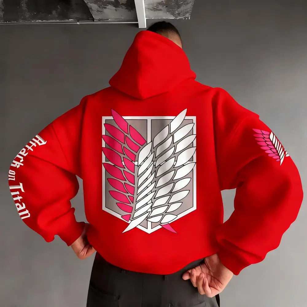 Back view of a red attack on titan wings oversized unisex hoodie with pink and white winged emblem and text on sleeve