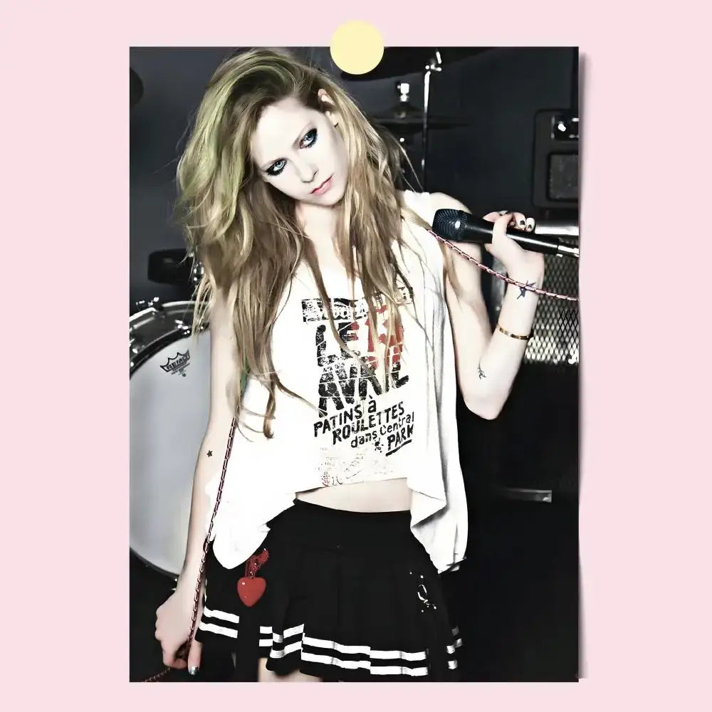 Avril lavigne wall poster printed photo wearing white graphic tee and black skirt with white stripes holding microphone