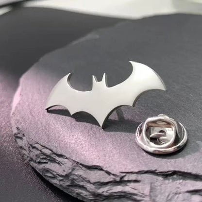 Silver batman symbol lapel pin with sleek metallic finish made of stainless steel enamel material